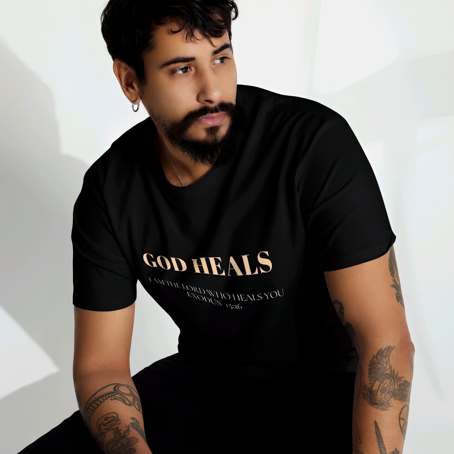 God Heals Men’s premium heavyweight tee